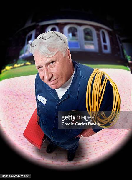 repair man at door seen through peep-hole - peephole stock pictures, royalty-free photos & images