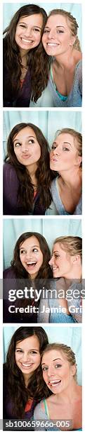 two teenage girls (14-17) in photo booth - photo booth stock pictures, royalty-free photos & images