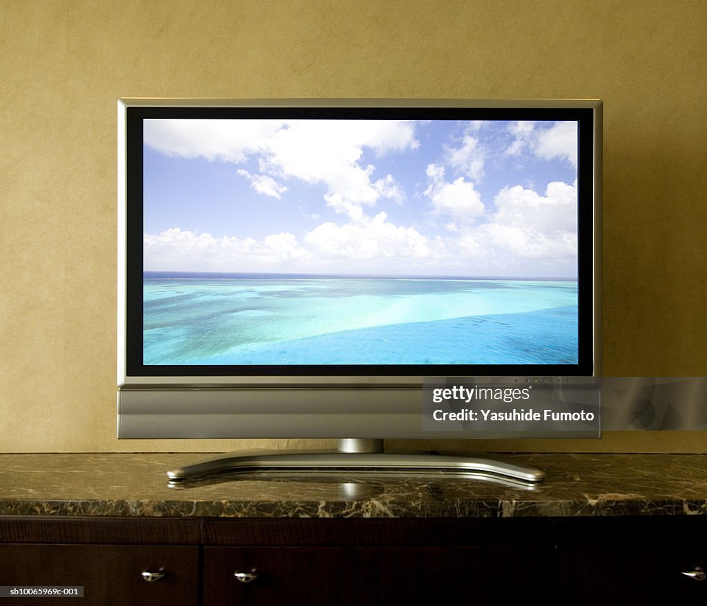 TV screen showing seascape (digital composite)