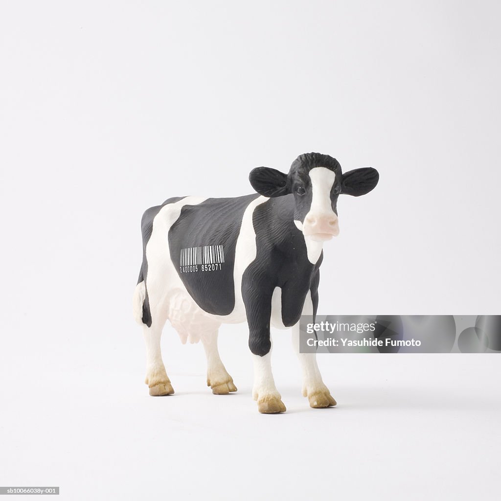 Cow figurine with bar code