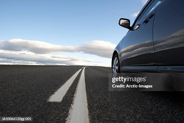 car on road in non-urban setting - non motorised vehicle stock pictures, royalty-free photos & images