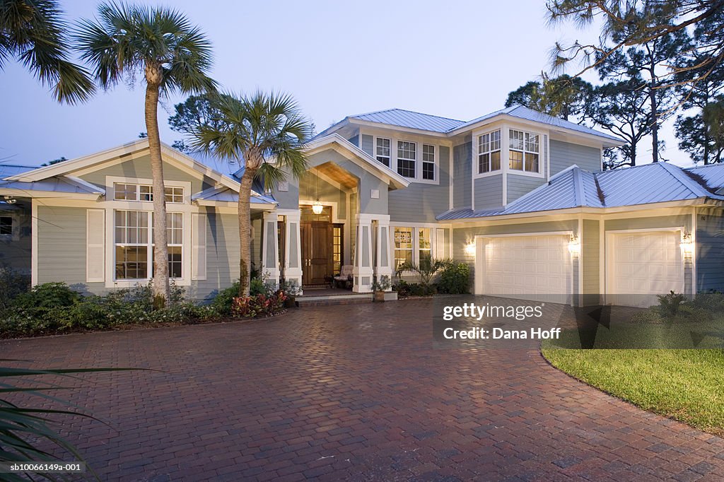 Front exterior of modern house at sunset