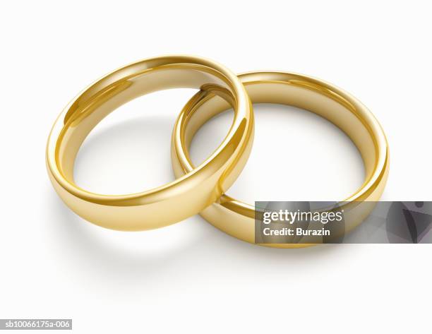 pair of wedding bands - alliances photos et images de collection