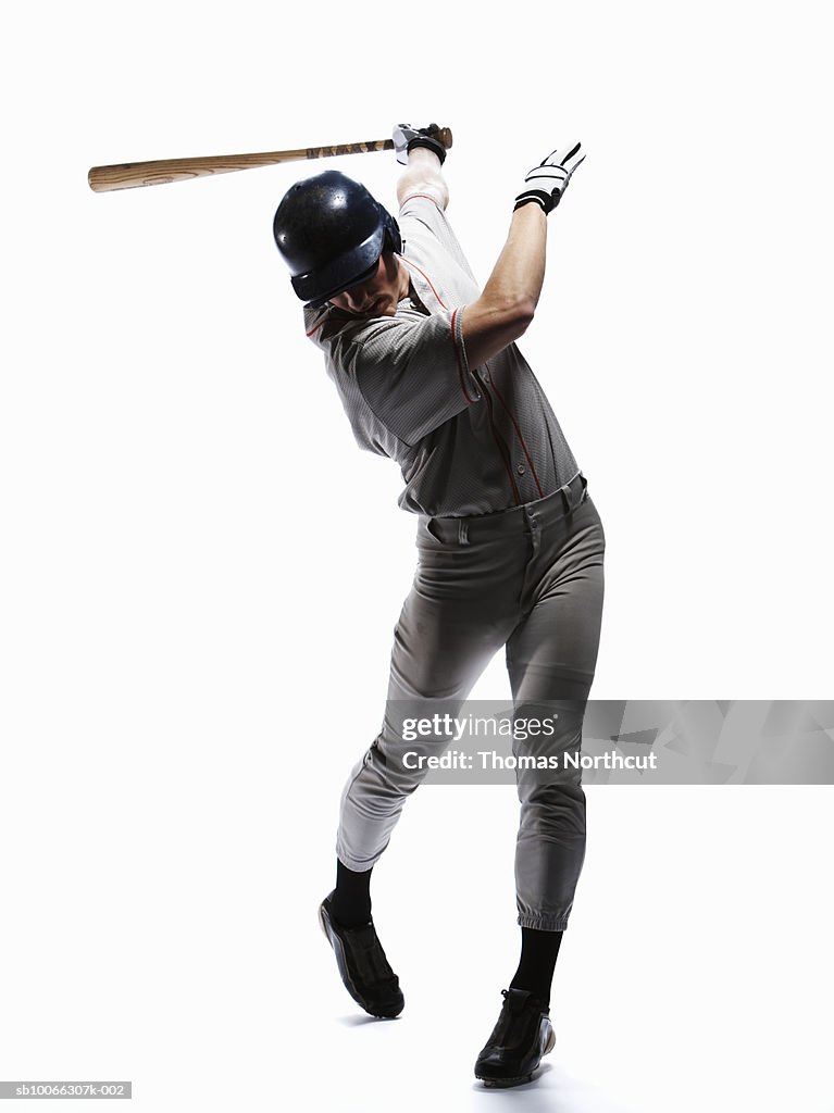 Baseball player swinging bat
