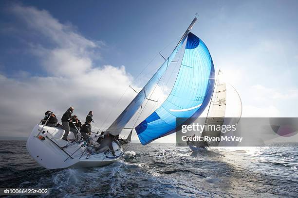 crew members on racing yacht - concurrent stockfoto's en -beelden