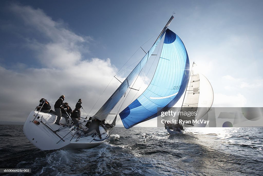 Crew members on racing yacht