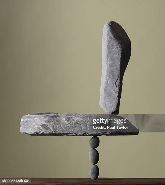 balancing rocks, studio shot - rock object stock pictures, royalty-free photos & images