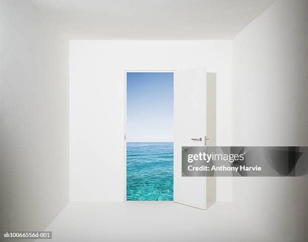 white room with aquamarine water and sky seen through open door (digital composite) - open door imagens e fotografias de stock