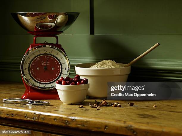 baking ingredients sit on table - kitchen scale stock pictures, royalty-free photos & images