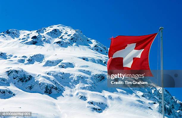 swiss alps, klosters, switzerland - flagge schweiz stock-fotos und bilder