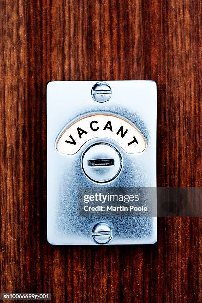 vacant sign on wooden door - vacant or engaged sign stock pictures, royalty-free photos & images