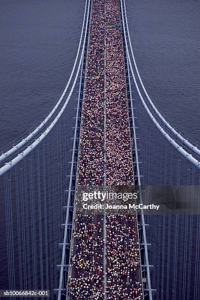 usa, new york city, marathon race across verrazano narrows bridge, elevated view - new york marathon stock pictures, royalty-free photos & images