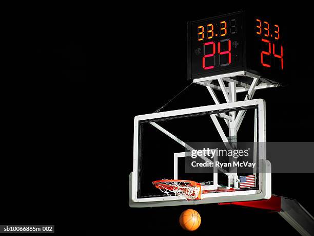 basketball passing through hoop, low angle view - atirar ao cesto imagens e fotografias de stock