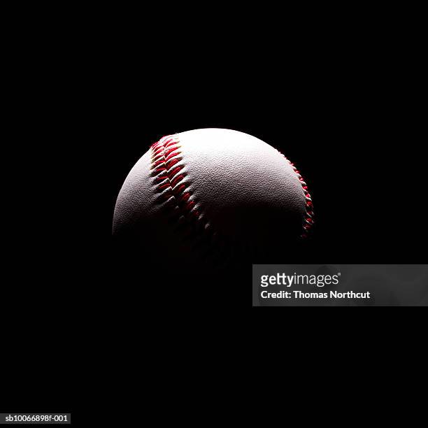 baseball in shadows - baseball equipment stockfoto's en -beelden