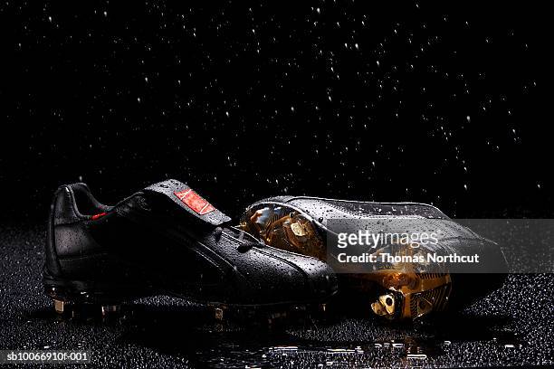 pair of soccer shoes - soccer boot stock pictures, royalty-free photos & images