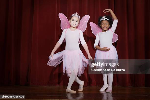 girls (6-9) performing ballet on stage, smiling - stage seven stock pictures, royalty-free photos & images