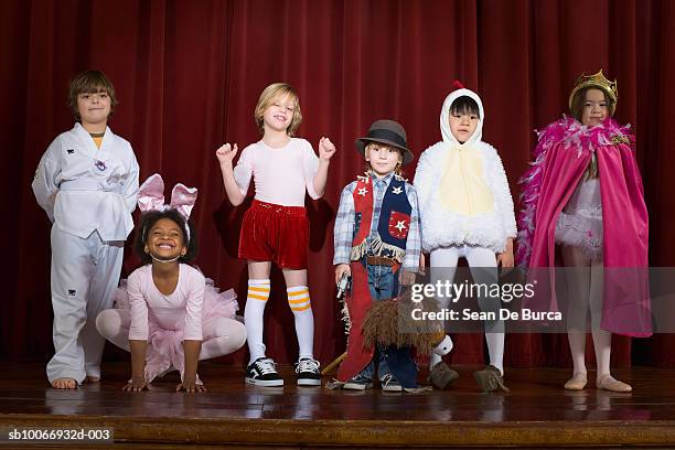 group of children (4-9) on stage - stage seven stock pictures, royalty-free photos & images