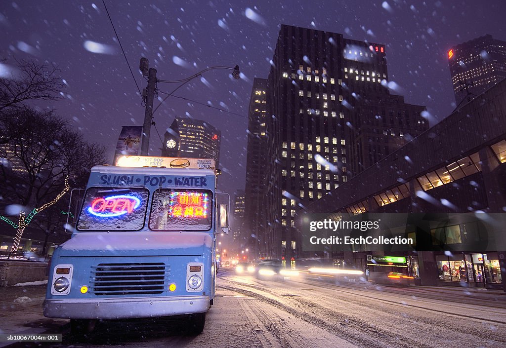 Canada, Toronto, Hot Dog Van in middle of snowstorm in downtown