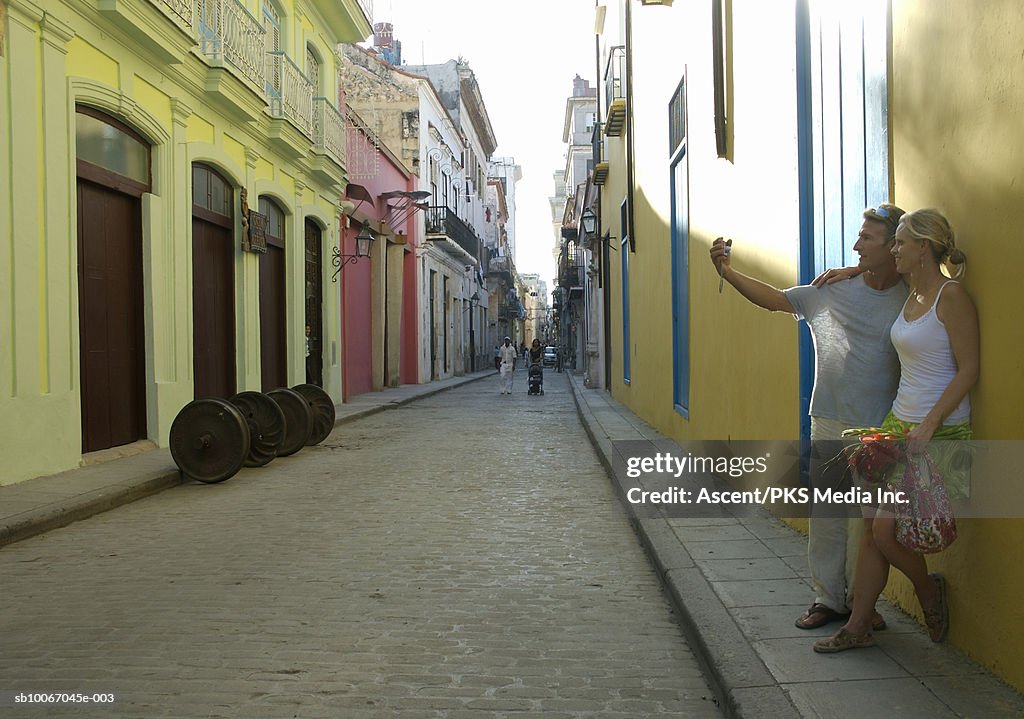 Mature couple taking picture of themselves