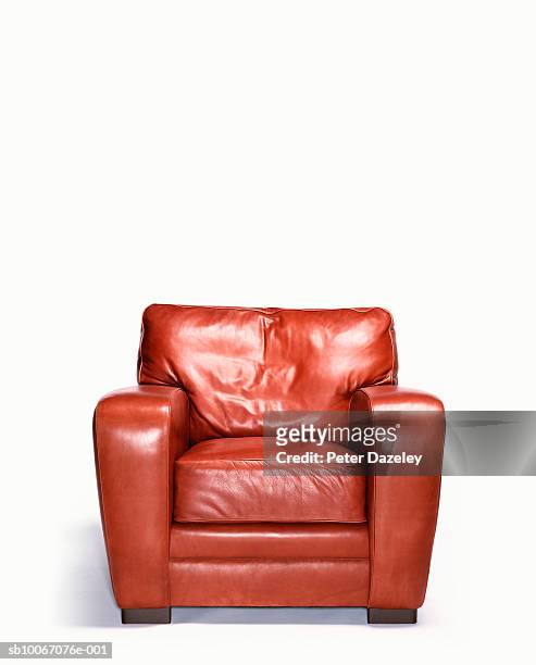 empty leather armchair - sedia foto e immagini stock