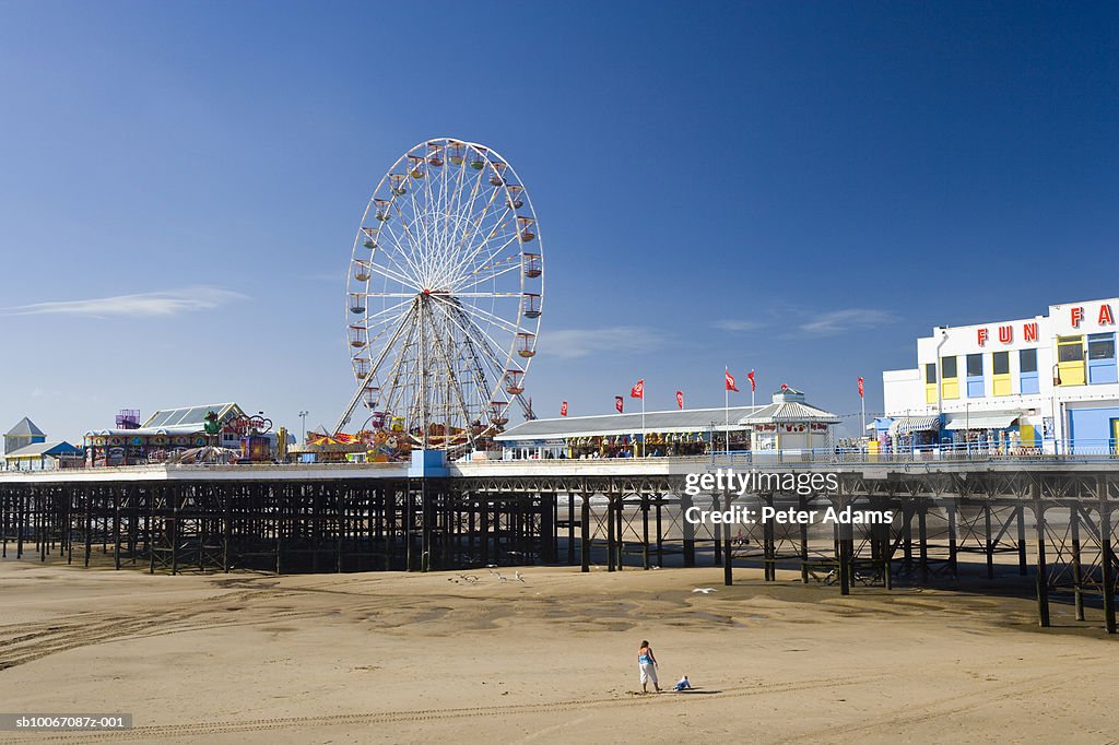 United Kingdom, England, Lancashire, Ferris wheel and pier at Blackpool