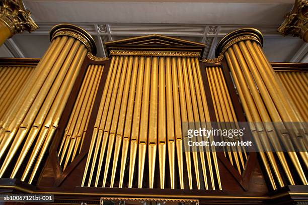 organ in church, low angle view - church organ stock pictures, royalty-free photos & images