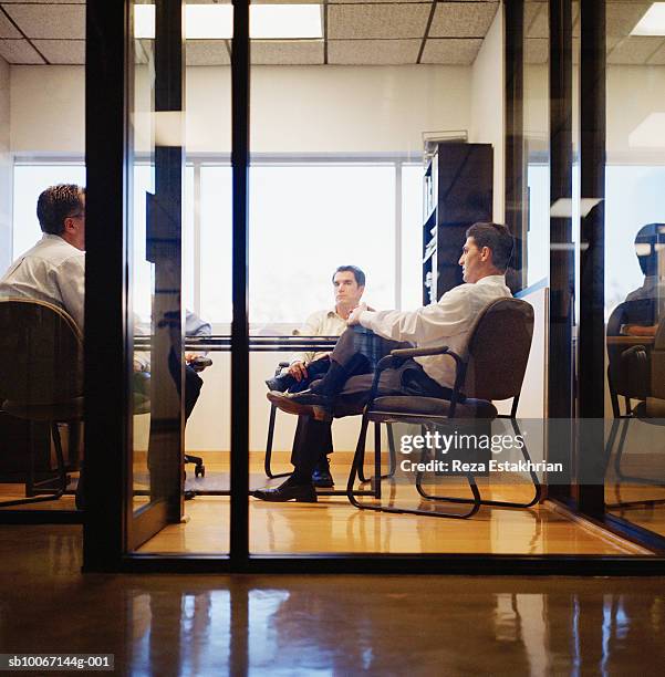 business men in meeting in office - only men boardroom stock pictures, royalty-free photos & images