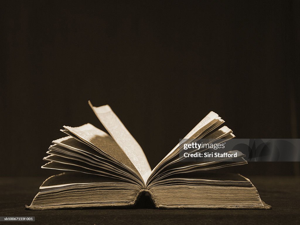 Open old book, studio shot