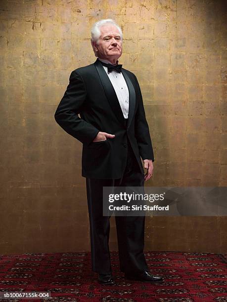 senior man wearing tuxedo, portrait, studio shot - smoking imagens e fotografias de stock