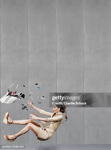 woman falling down on pavement - women in slips stock pictures, royalty-free photos & images