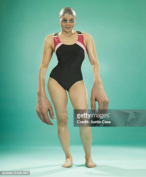 female swimmer with large hands (digital composite) - female swimmer bildbanksfoton och bilder