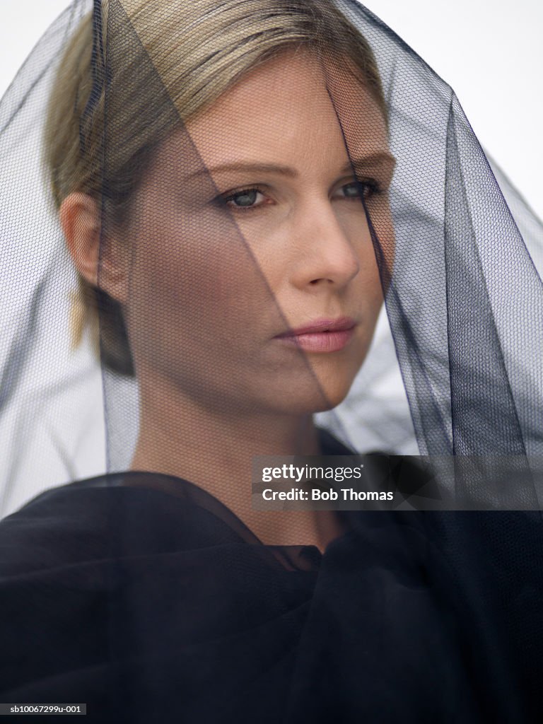 Woman wearing veil, close-up