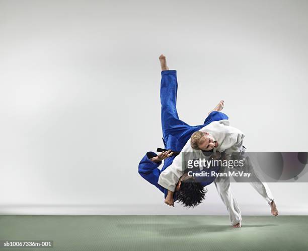 two men fighting judo - martial arts man stock pictures, royalty-free photos & images
