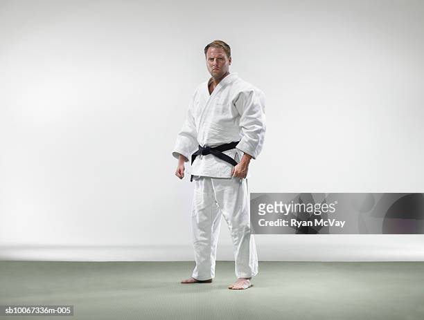 man in judo robe, portrait - gidräkt bildbanksfoton och bilder