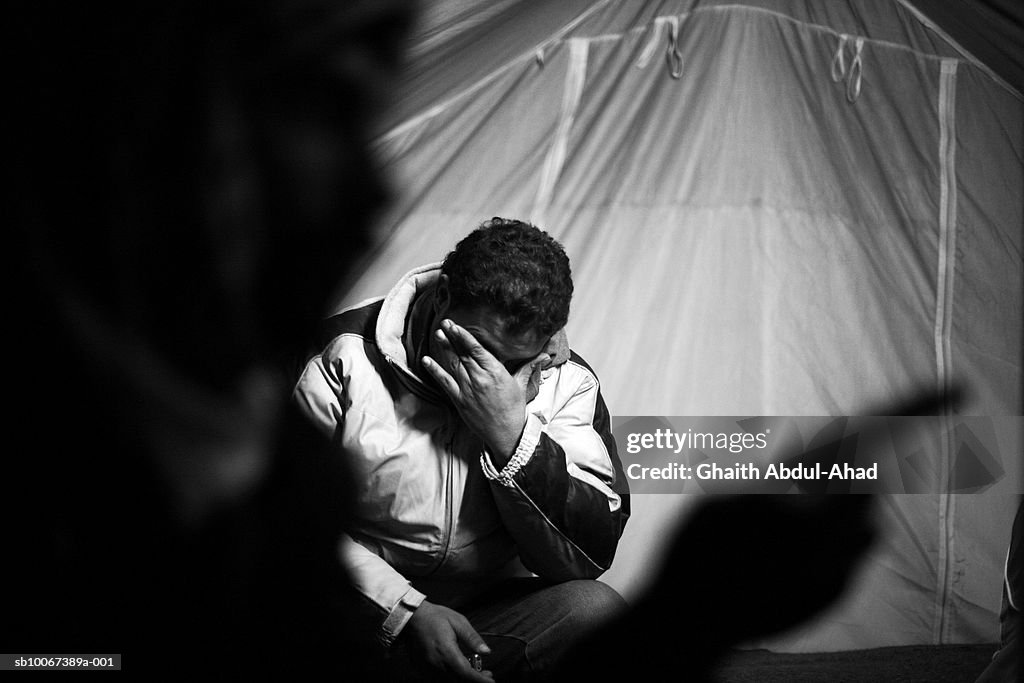 Iraq, No Mans Land, man in refugee camp