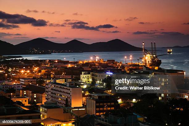 new caledonia, grande terre island, noumea, illuminated cityscape at night - noumea stock-fotos und bilder