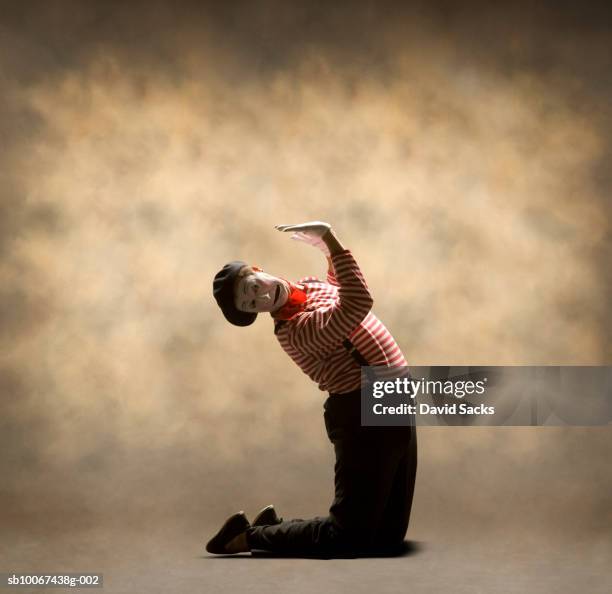 mime stuck inside small box - mime stock pictures, royalty-free photos & images