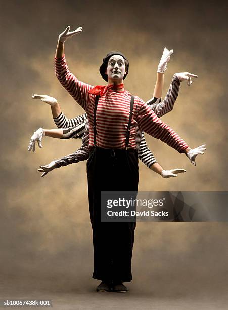 mime with multiple pairs of arms - pantomime stock pictures, royalty-free photos & images