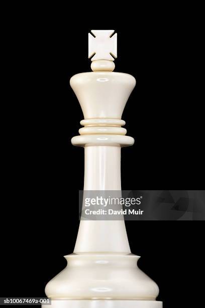 king chess piece on black background, close-up - chess king stockfoto's en -beelden