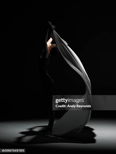 woman dancing, side view - veiled woman stock pictures, royalty-free photos & images