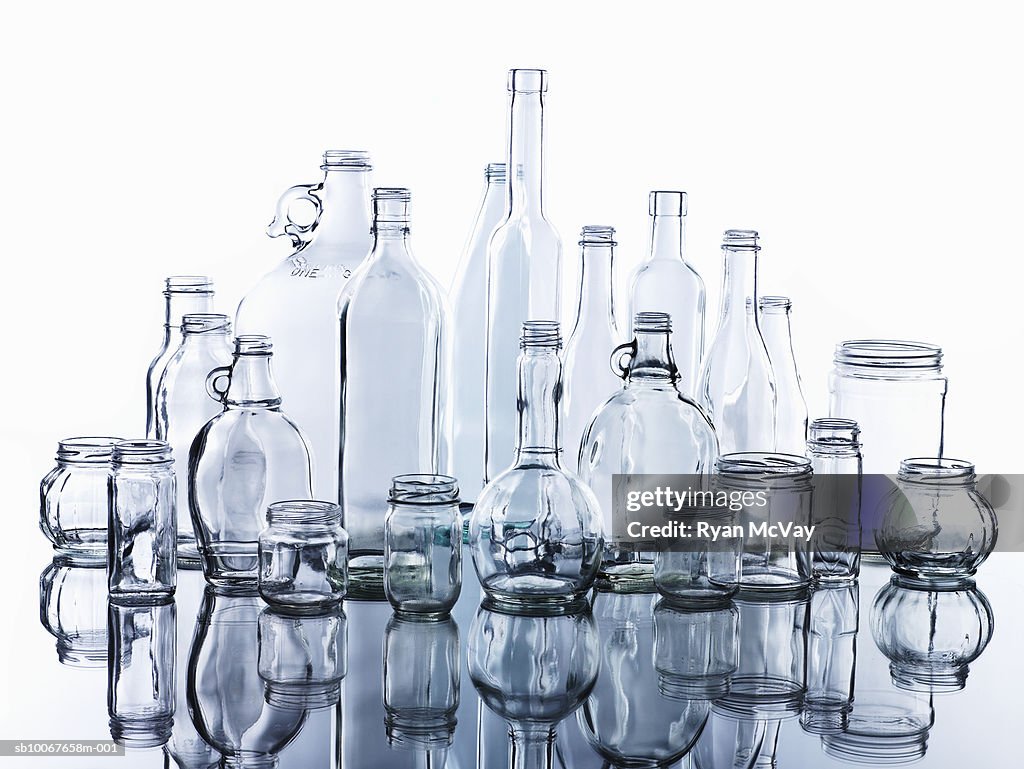 Collection of various glass bottles and jars