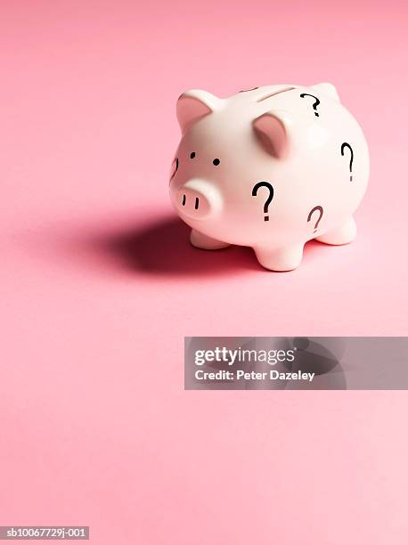 piggy bank - saving up for a rainy day stock pictures, royalty-free photos & images