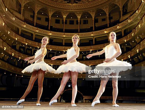 three teenage ballet dancers on stage - ballerina ストックフォトと画像