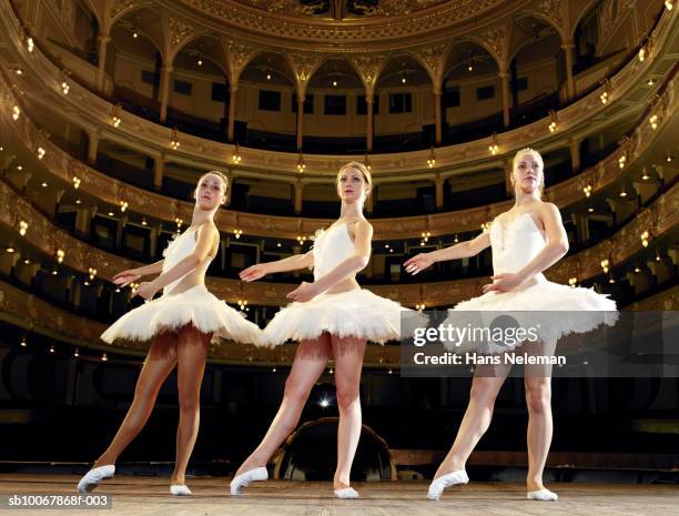 three teenage ballet dancers on stage - ballet class stock pictures, royalty-free photos & images