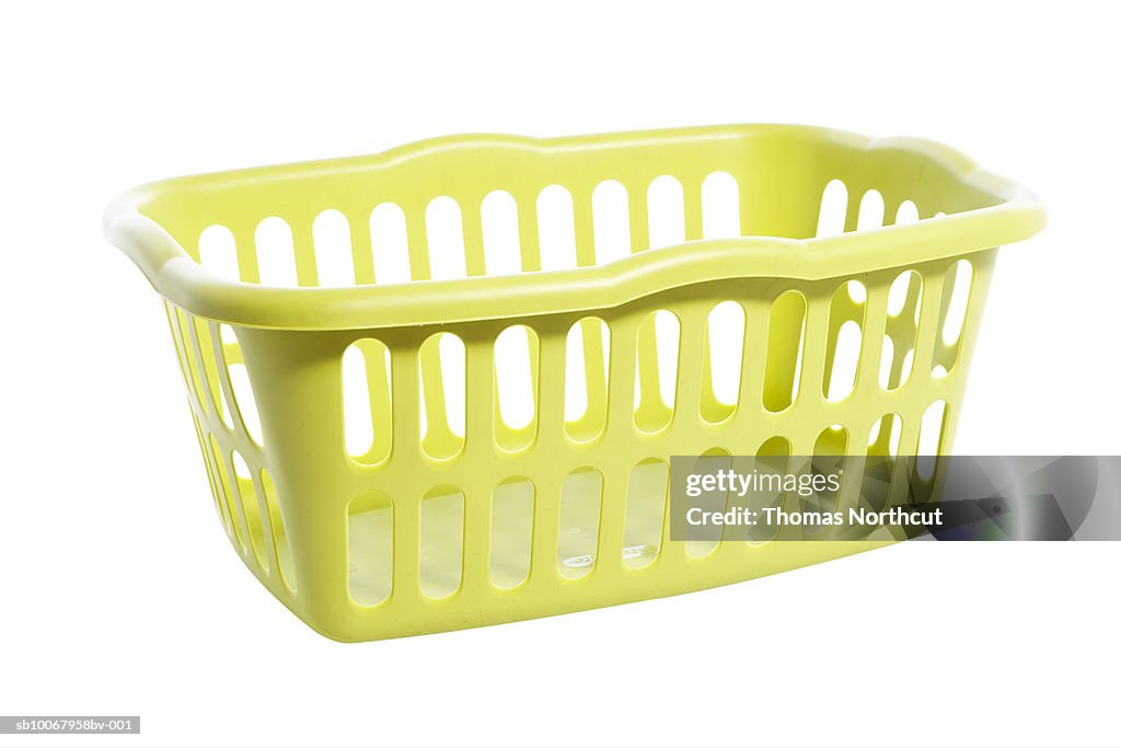 Empty laundry basket on white background