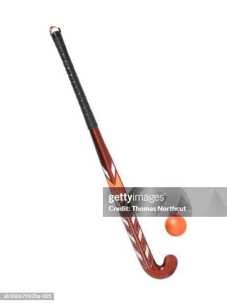 field hockey ball and stick on white background - hockey stick stock pictures, royalty-free photos & images