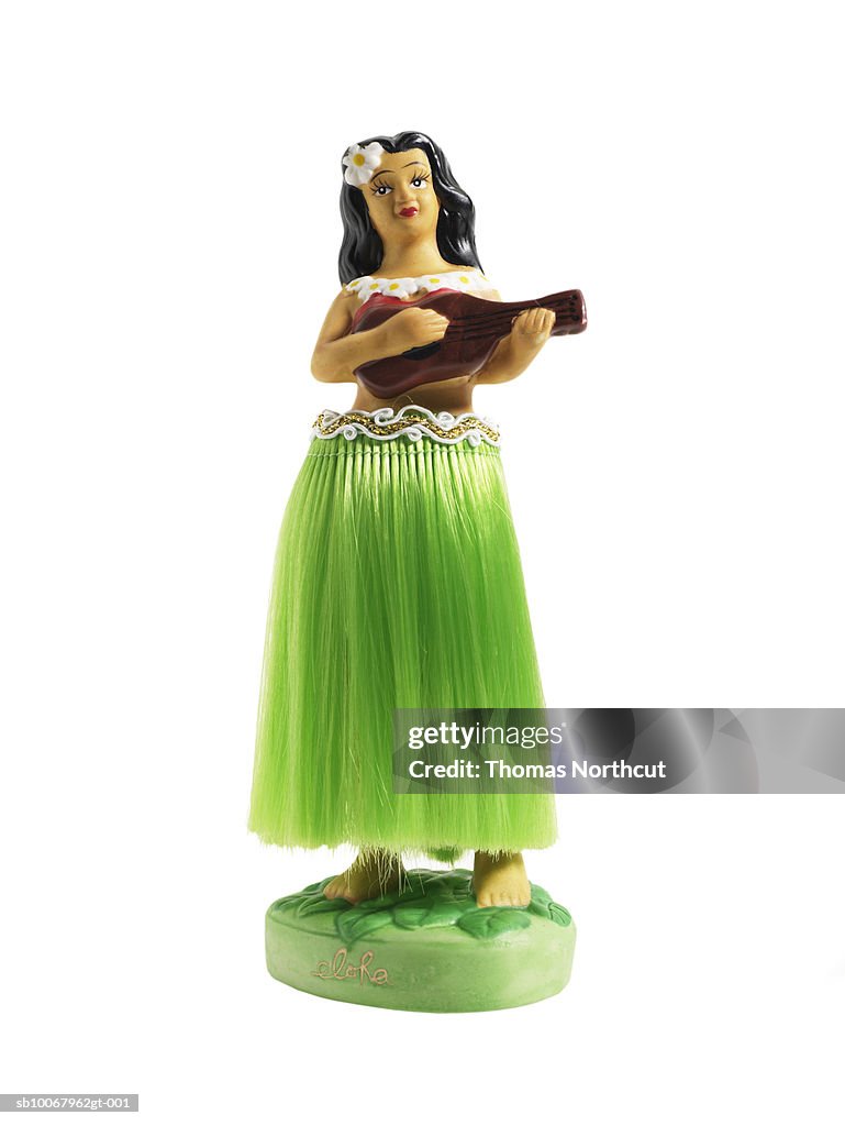 Hula dancing doll on white background