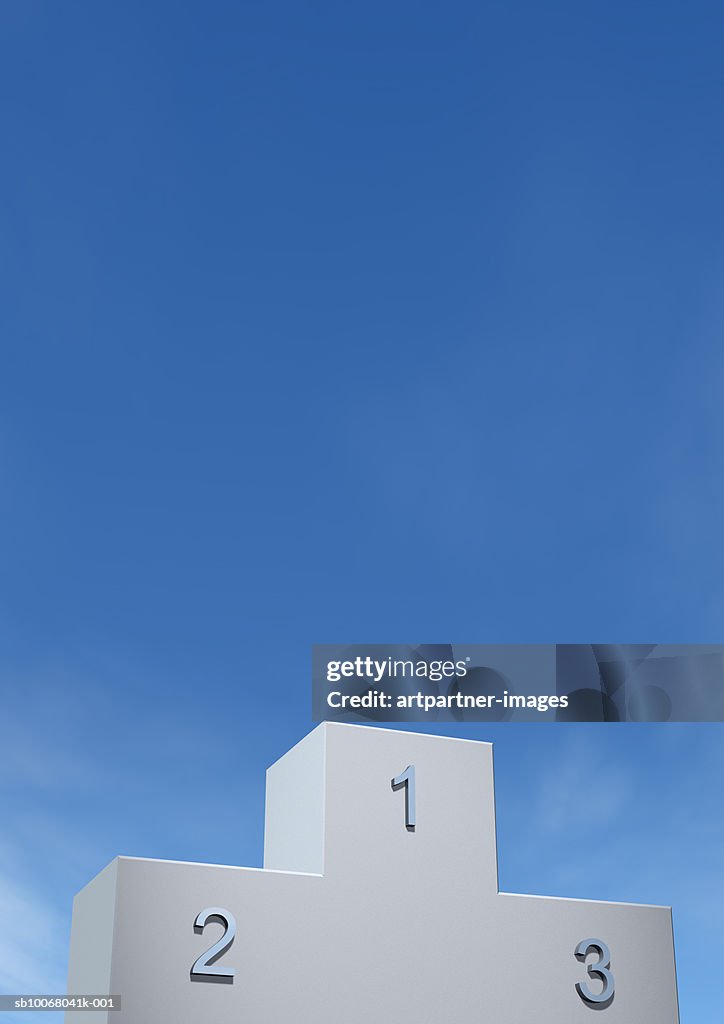 Winners podium against blue sky