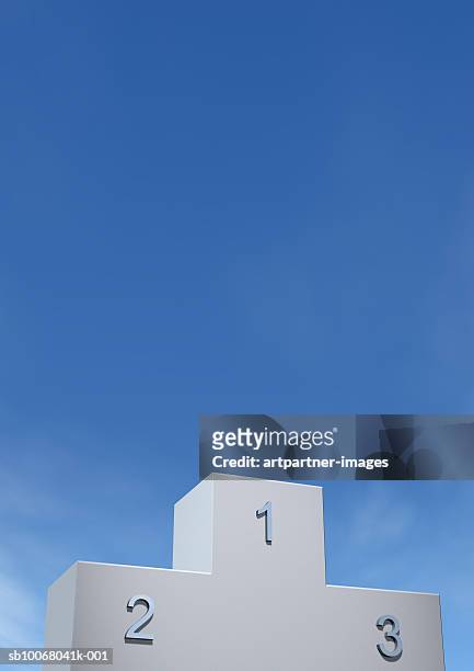 winners podium against blue sky - siegerpodest stock pictures, royalty-free photos & images