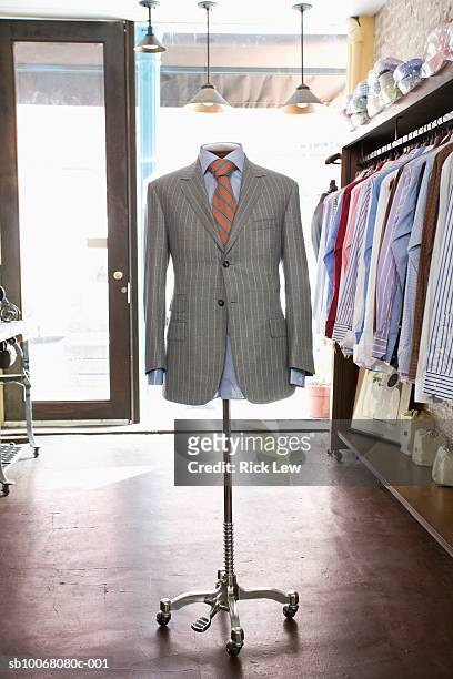 dressmaker's model with grey jacket in store - トルソー ストックフォトと画像